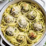 Creamy Garlic Pasta Nests with Pesto Chicken Meatballs