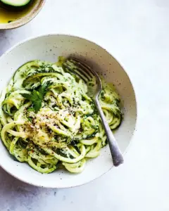Creamy Zucchini Noodles with Spring Onion Sauce Cheesy Sunflower Sprinkle